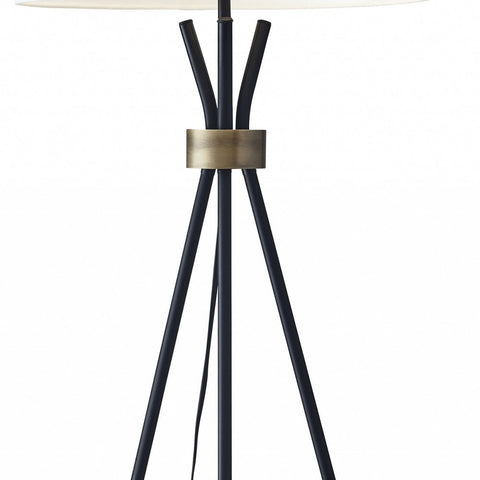 Black Metal Tripod Leg Floor Lamp with Antique Brass Accent