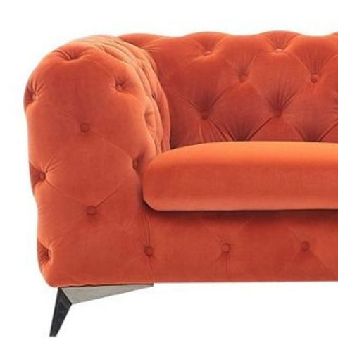 74" Orange Tufted Velvet And Black Chesterfield Love Seat